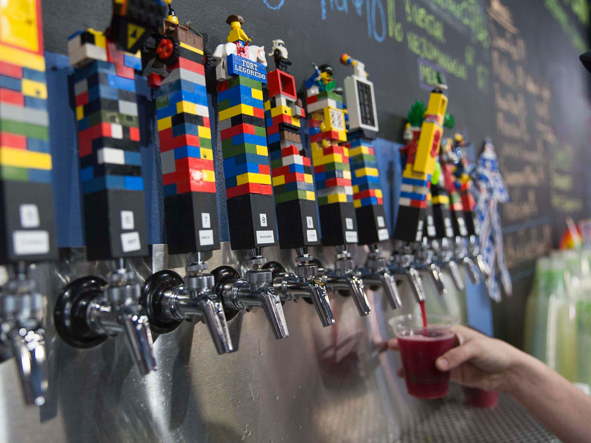 The Overflowing Brewery and its Lego taps are a popular neighborhood spot in Palmetto Park. (Credit: VisitStPeteClearwater.com) 